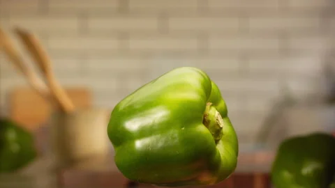 Green bell pepper jumping in slow motion Stock Footage 152903965