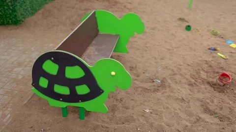 Green bench in kindergarten in shape of turtle. Stock Footage 270938156