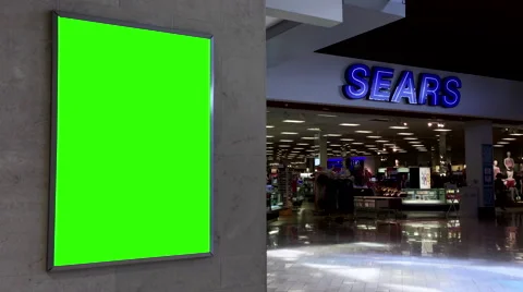 Green billboard for your ad in front of Sears store in Coquitlam mall Stock Footage 65392479