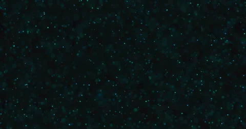 Green blue abstract bubbles particles bokeh on black background, event Stock Footage 324496126
