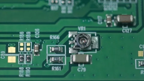 Green board with microcircuits, macro shooting Stock Footage 73443316
