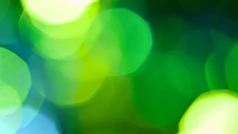 Green bokeh light effect abstract background, animation of sparkle circles Stock Footage 125615667