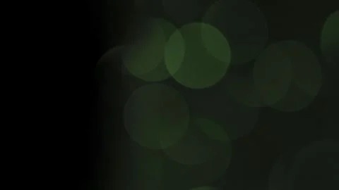 Green bokeh light falling on a leak in the dark Stock Footage 319392052