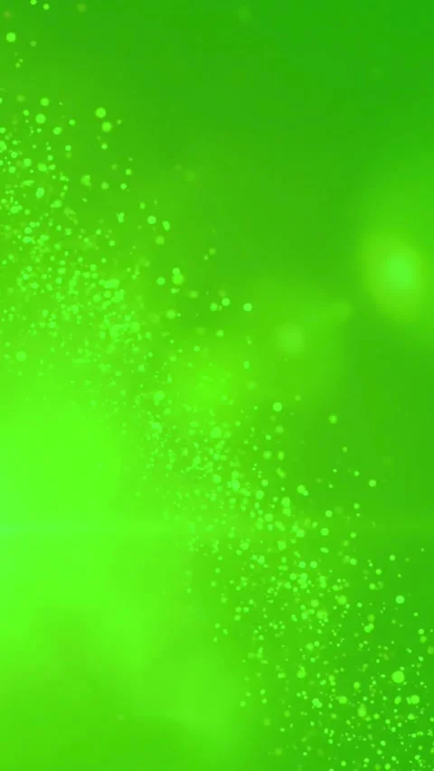 Green bokeh light particles moving across abstract background Stock Footage 328019923