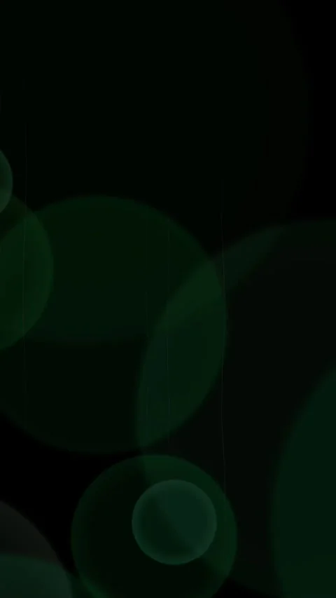 Green Bokeh Lights Floating on Dark Vertical Background Stock-Footage 337529571