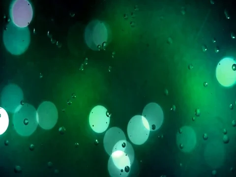 Green Bokeh with Rain Stock Footage 73618024