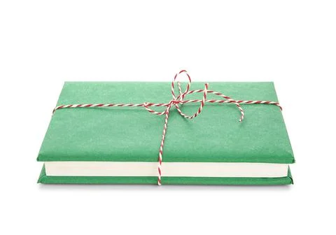 Green book tied with string on white background. Christmas celebration Stock Photos