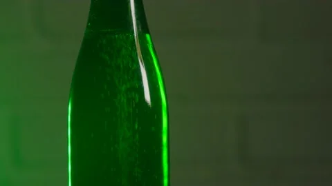 Green bottle with gas bubbles inside Stock Footage 185027122