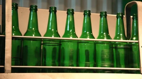 Green bottles in a line Stock Footage