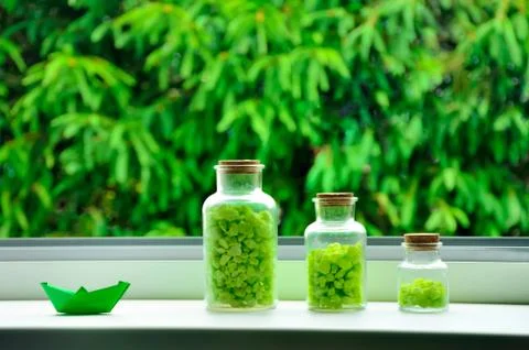 Green bottles, spring background, edit space Stock Photos
