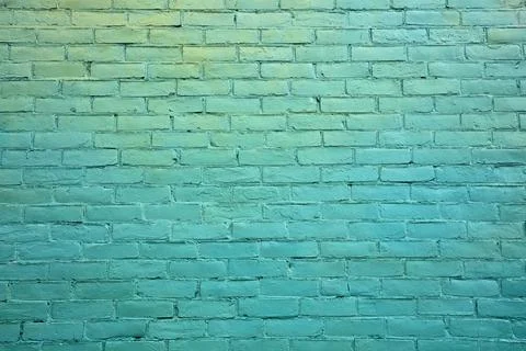 Green brick wall pattern texture background city style graphic painted concre Stock Photos