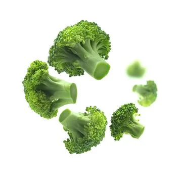 Green broccoli levitating on a white background Stock Photos