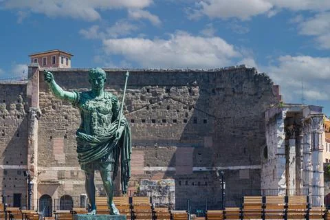 Green bronze statue of emperor Caesar Augustus on Via dei Fori Imperiali, Rome Stock Photos