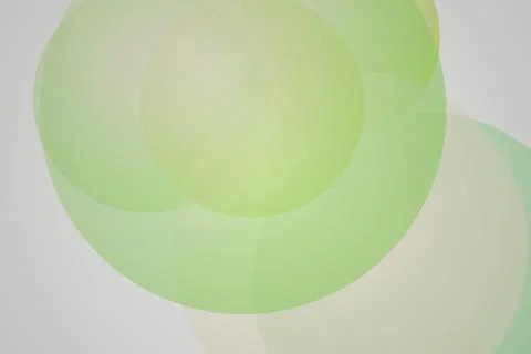 Green bubbles floating on a light pastel background Stock-Illustration