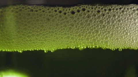 Green bubbles floating on a liquid radioactive poison. Stock Footage 89309920