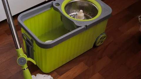 Green bucket and mop Stock Footage 120128998