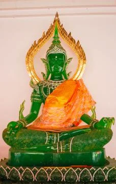 Green Buddha statue Stock Photos