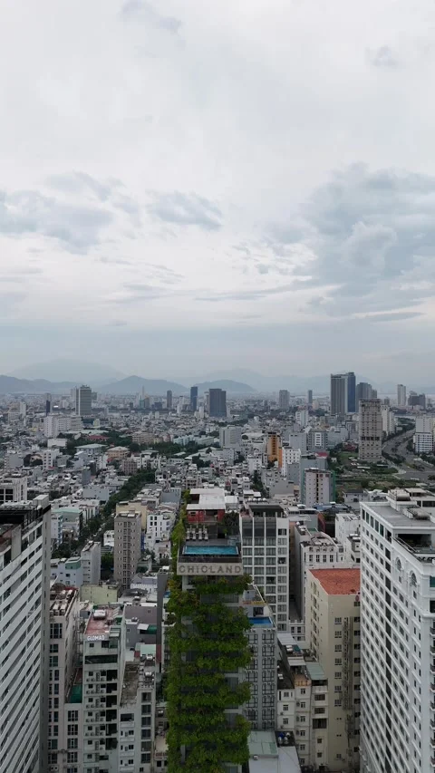 Green Building with a Rooftop Pool in Da Nang, Vietnam Stock Footage 340149762
