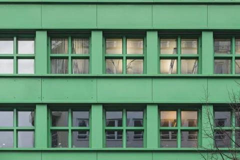Green bulding windows Stock Photos