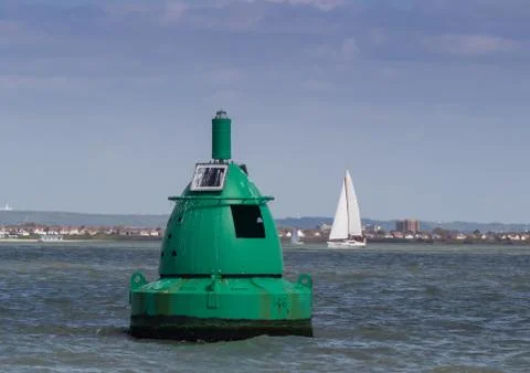 Green buoy Stock Photos