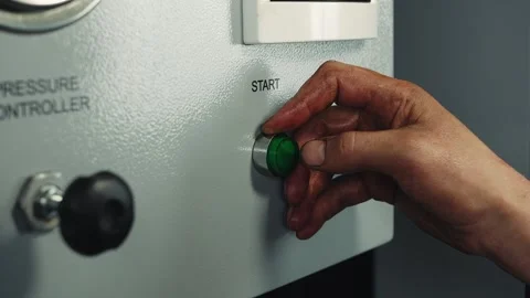 Green button power on with Start sign, finger pushing button and start engine Stock Footage 285643867