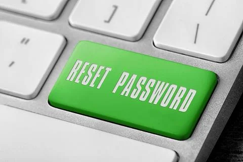 Green button with text RESET PASSWORD on keyboard, closeup view Stock Photos