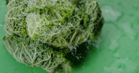 Green cabbage is falling in Super Slow-motion 1000 fps Stock-Footage 161800231