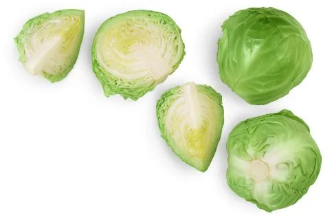 Green cabbage with half isolated on white background with clipping path and full Stock Photos