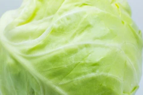Green cabbage texture background. Close up. Macro photo. Natural eco wallpa.. Stockfoto's