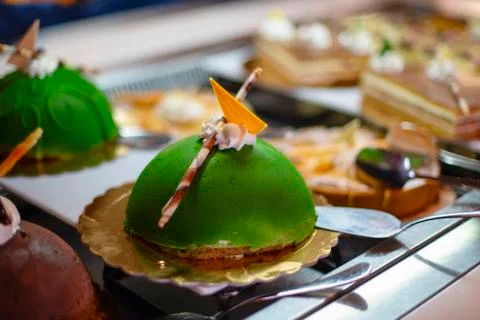 The green cake on the buffet Stock Photos