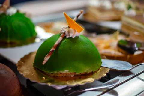 The green cake on the buffet Stock Photos