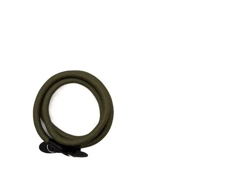 Green camera strap in the form of a rope on a white background. copy space, t Stock Photos