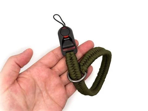 Green camera strap in the form of a rope on a white background. copy space, t Stock Photos