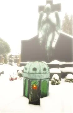 Green candle lantern on a grave Stock Photos
