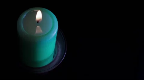 A green candle, time lapse Video stock 54487749