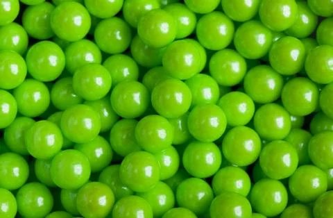 Green candy pattern, gummy ball candies for background Stock Photos