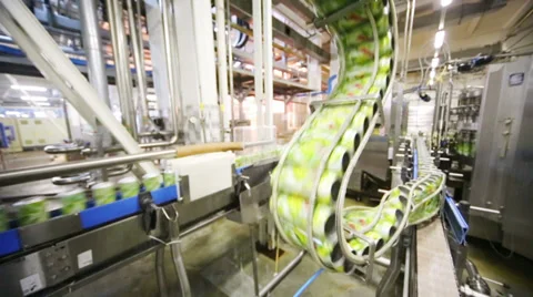 Green cans move fast on conveyor in Ochakovo factory Stock Footage 32430342
