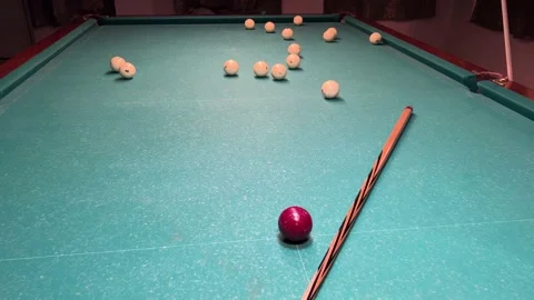 The green canvas of the Russian billiards on which the cue and the red ball lie Stock Footage 171608577