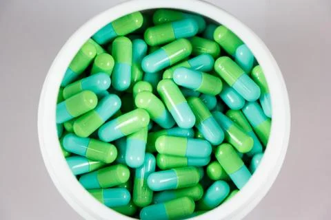 Green capsules Stock Photos
