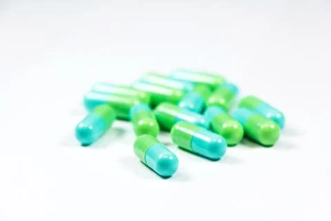 Green capsules Stock Photos