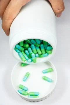 Green capsules Stock Photos