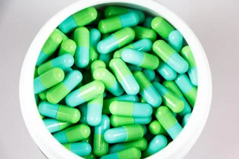 Green capsules Stock Photos