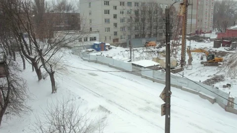 Green car on background winter construction Stock Footage 71222053