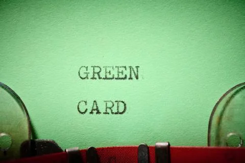 Green card text written with a typewriter. Stock Photos
