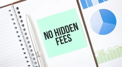 Green card on the white notepad. Text NO HIDDEN FEES. Business concept Stock Photos