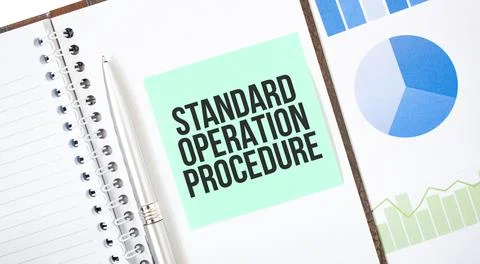 Green card on the white notepad. Text Standard Operation Procedure. Business  Stock Photos