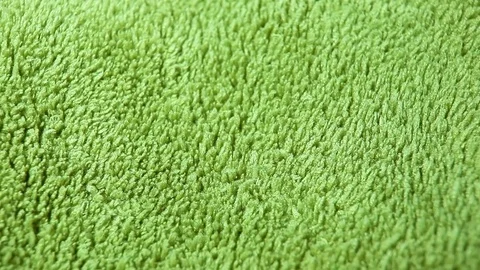 Green Carpet fabric rotating pattern macro texture background backdrop footage Stock Footage 91381622