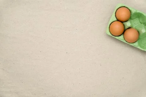 Green carton of different eggs. Easter background Stock Photos