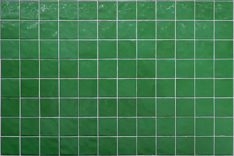 Green ceramic tile background. Old vintage ceramic tiles in green to decorate Stockfoto's