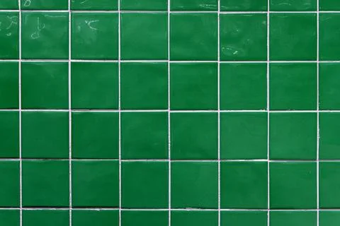 Green ceramic tile background. Old vintage ceramic tiles in green to decorate Stock Photos